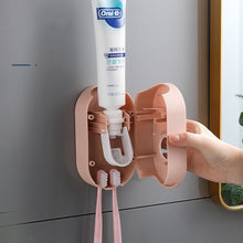 Load image into Gallery viewer, Automatic Toothpaste Squeezer Toothpaste Dispenser Toothbrush Holder Dental Cream Rack for Home Bathroom Tools Dropshipping